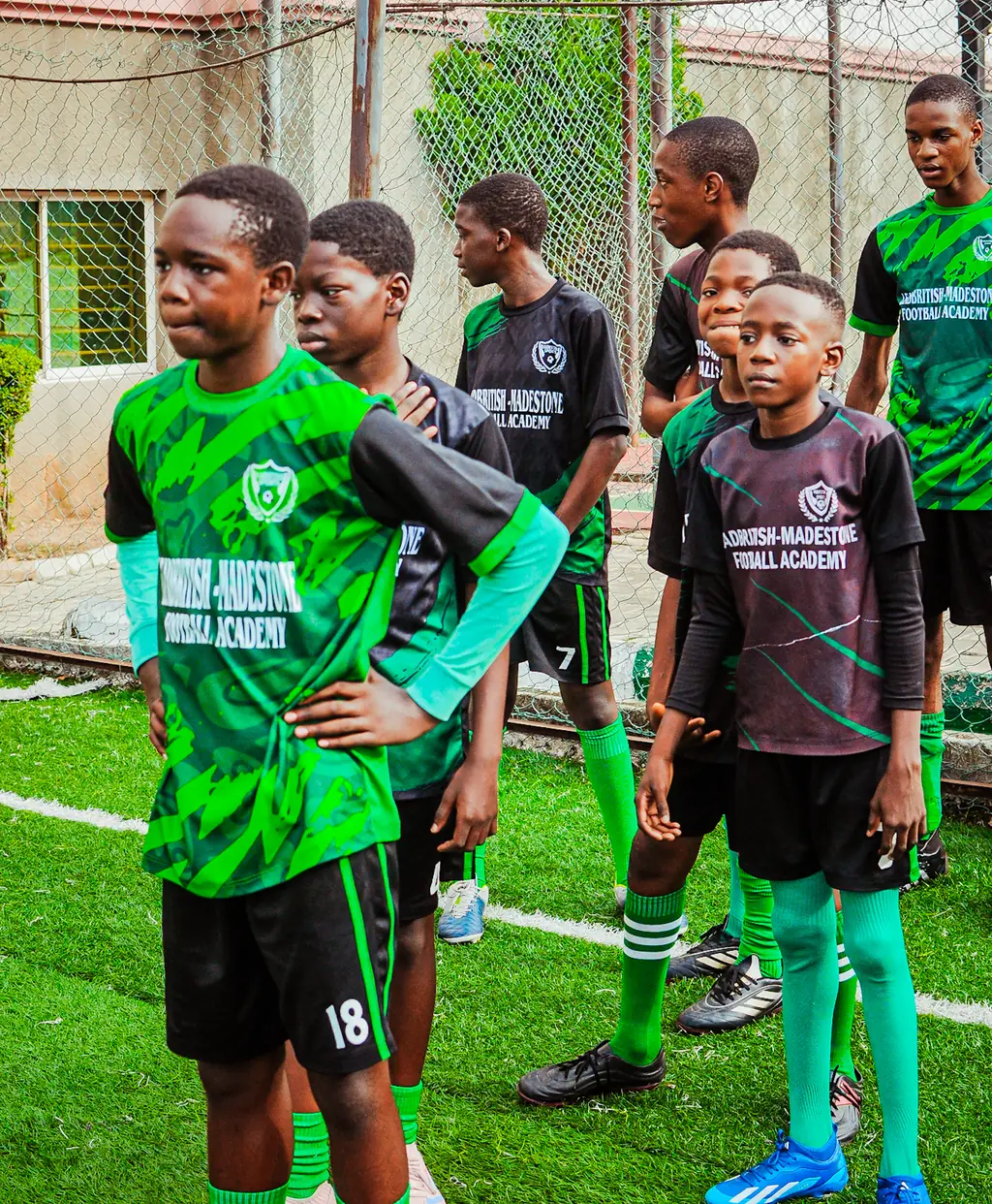 Three Madestone players in full kit standing together before a session